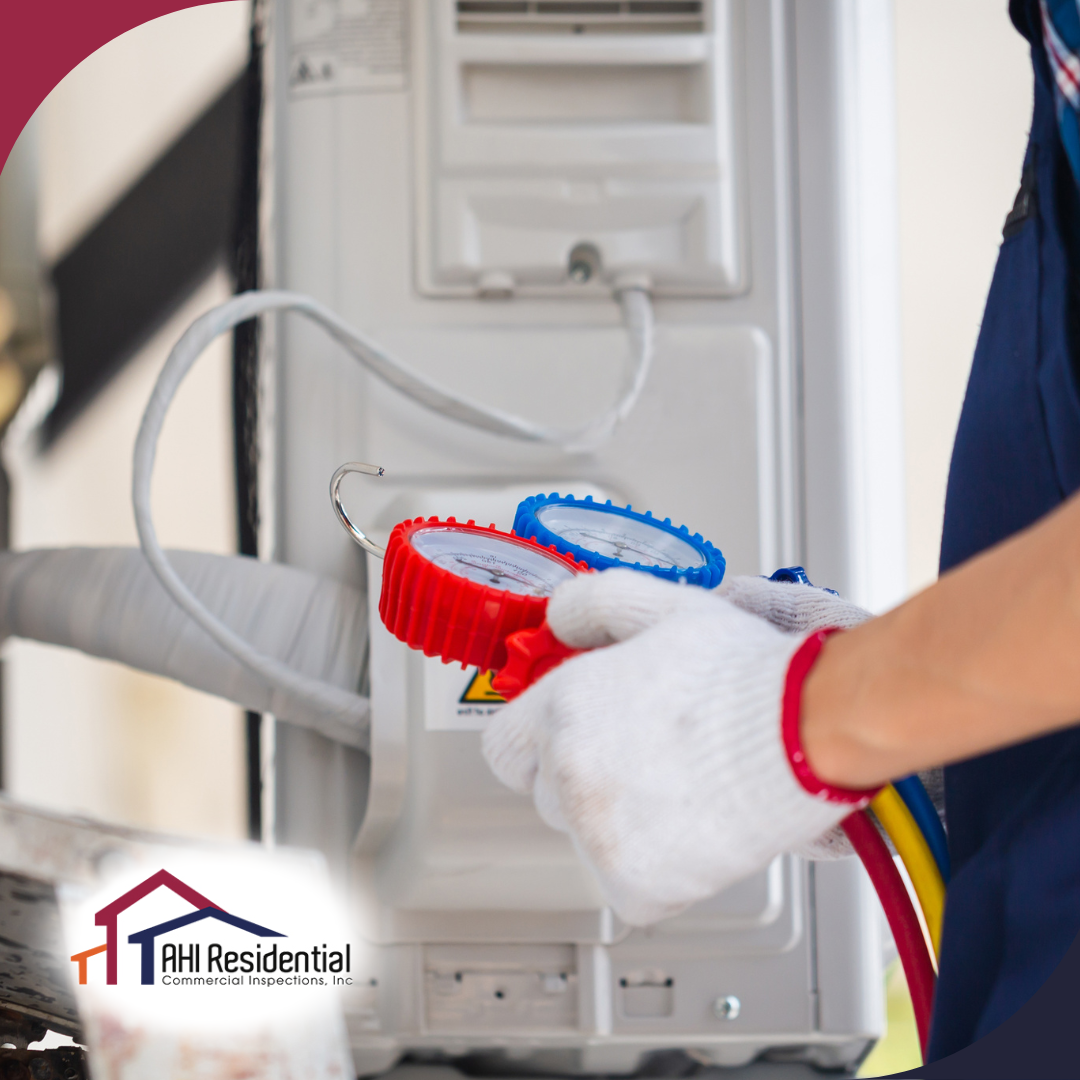 AHI Residential & Commercial Inspections(1) A home inspector in a plaid shirt and overalls performs an HVAC inspection using colorful pressure gauges.