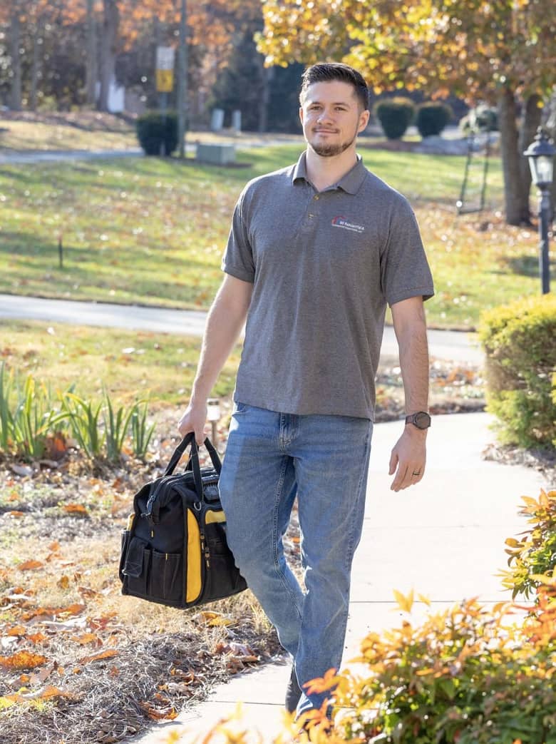 inspector walking up to property that is going to be inspected