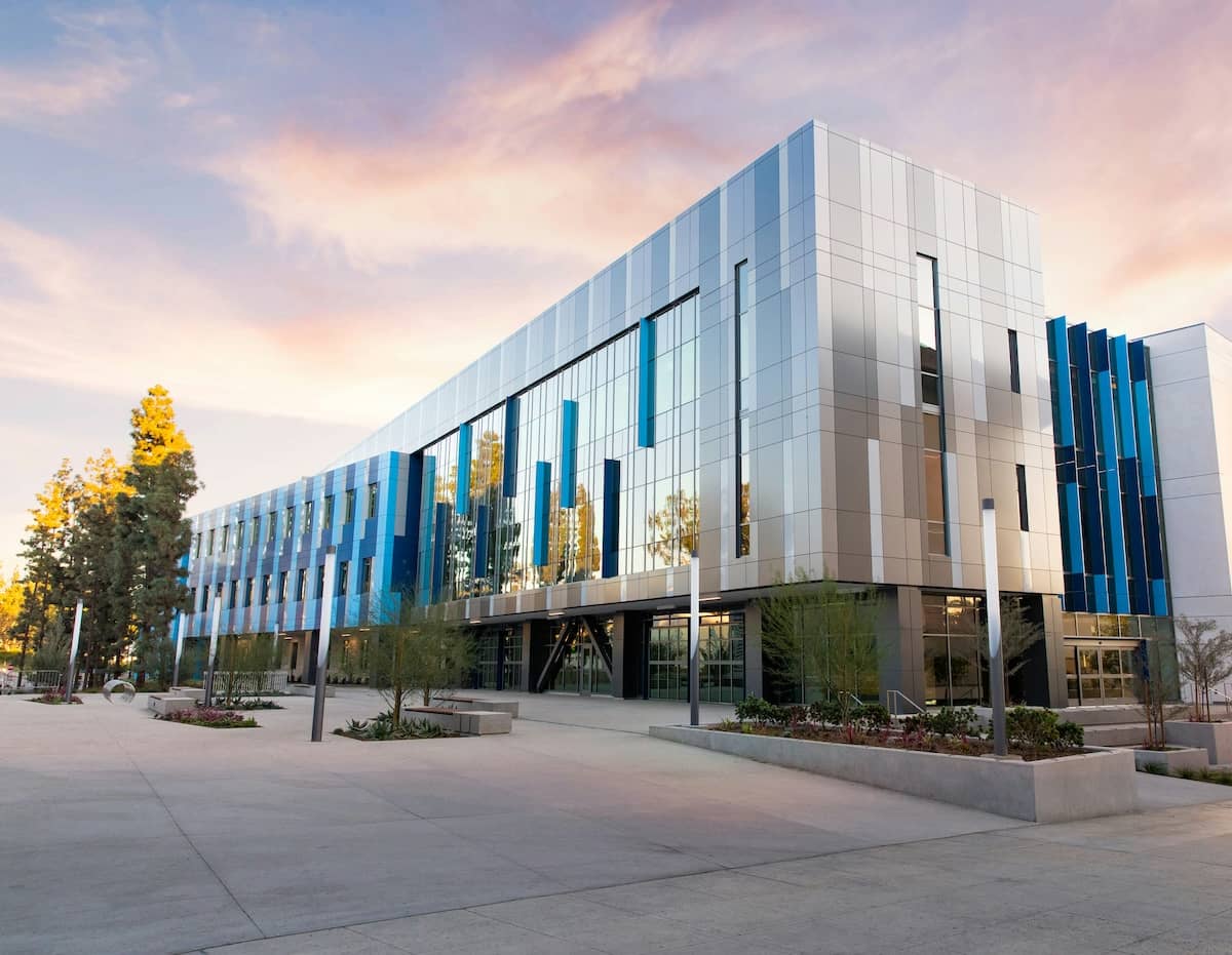 outside of a professional and modern office building that is having a commercial inspection done