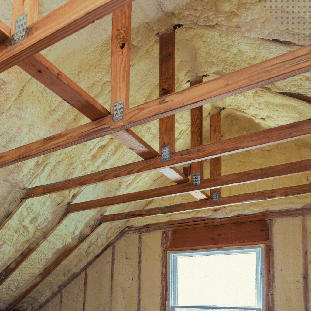 inside of an attic during a pre-drywall inspection when the framing and insulation are visible