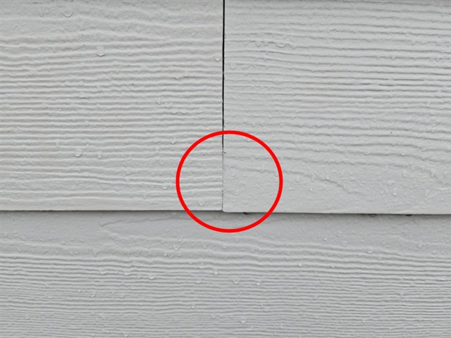 Gapped butt joint in fiber cement siding on Home C