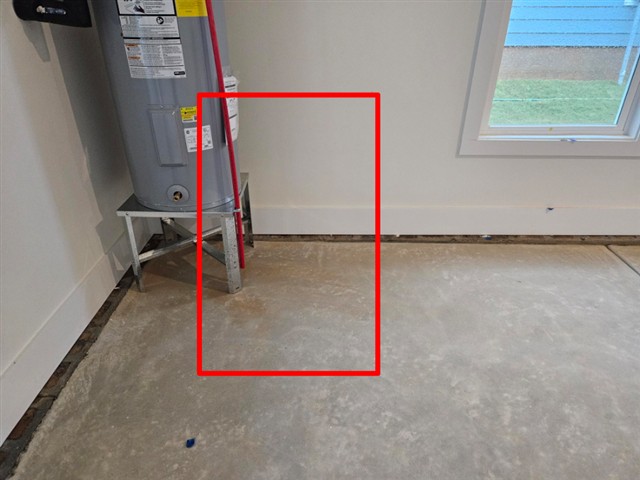 Water heater in the garage of Home C with no vehicle barrier