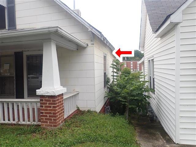 Home C: the right exterior wall is bowed, likely tied to the foundation problems below