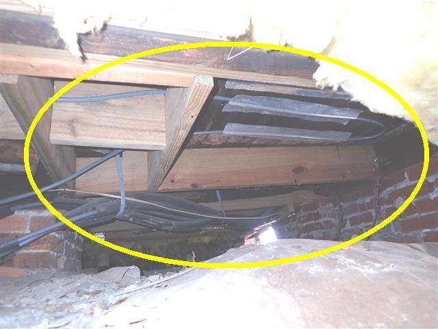 Home D: floor joists and drop girders repaired outside standard practice; the floors above slope