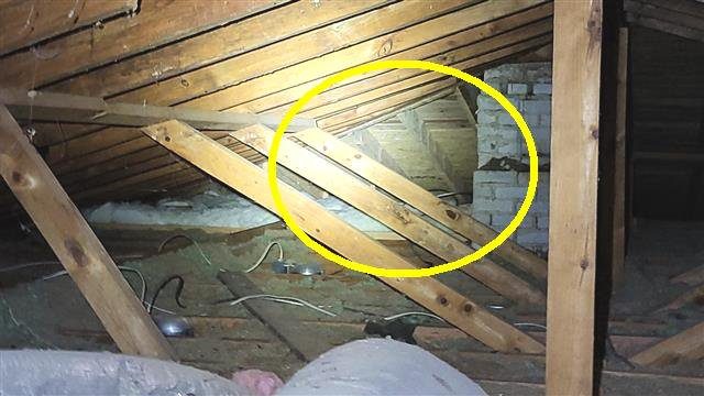 Home H: repaired roof framing in the attic, a sign of past tree damage