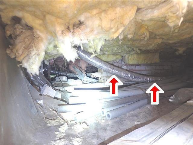 Home D: damaged supply ducts lying on the crawl space floor