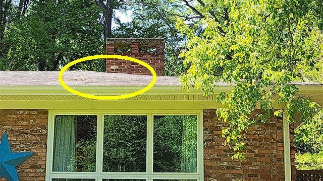 Home H: dips and sags in the roof line at the right front