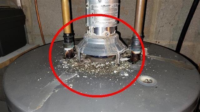Home H: signs of poor venting at the gas water heater, a carbon monoxide concern