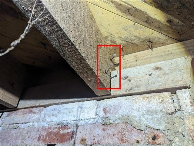 Home I: a floor joist notched where it sits on the band sill
