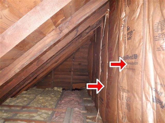 Home C: attic insulation installed with the vapor barrier on the wrong side
