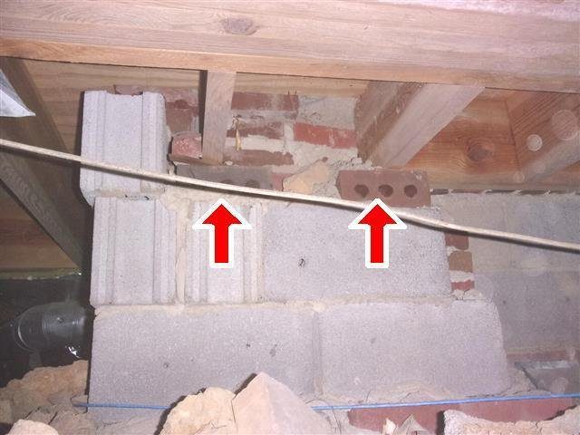 Home J: piers built with blocks and bricks laid the wrong way