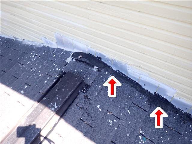Home D: headwall flashing tarred over instead of tucked under the siding