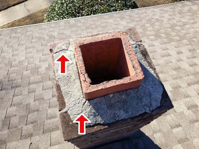 Home E: deteriorated chimney brick and mortar