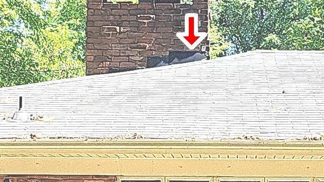 Home H: deteriorated chimney flashing, with water inside the chimney