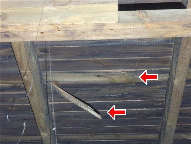 Home I: damaged and split roof boards in the attic