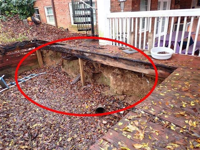 Home F: a deck rotted to the point that it isn't safe to walk on