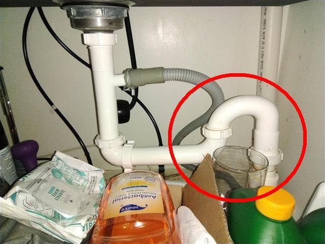 Home D: a kitchen sink trap installed upside down