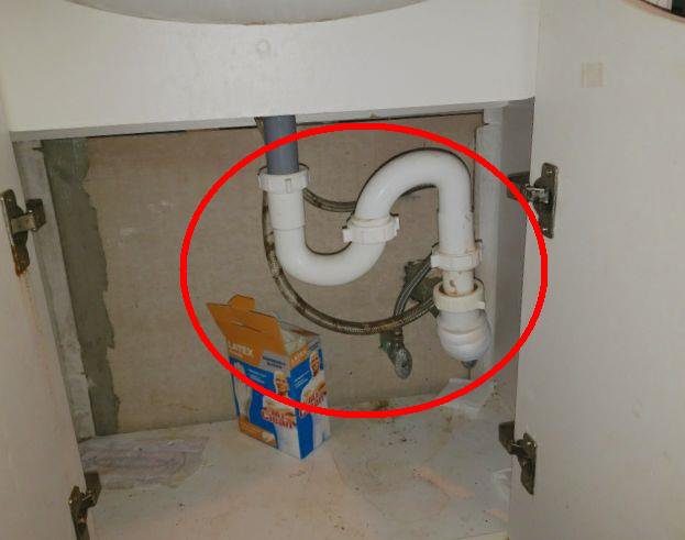 Home F: an S-trap under a bathroom sink