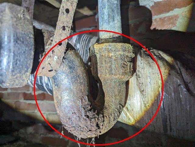 Home I: leaks at the tub drain and toilet