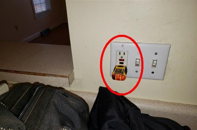 Home B: a kitchen GFCI outlet that didn't trip when tested