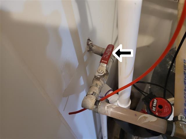 Corroded shutoff valve and fittings on a condo water line