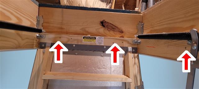 Brand New Doesn't Mean Problem-Free: A Gastonia New Construction Home Inspection 11 Pull-down attic stairs fastened with deck screws instead of nails