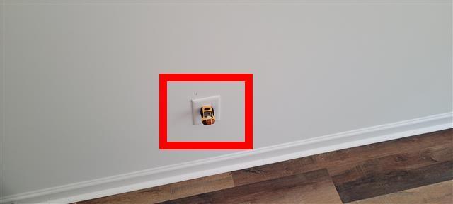 Brand New Doesn't Mean Problem-Free: A Gastonia New Construction Home Inspection 8 Outlet tester showing no power at a living room receptacle